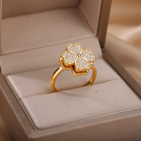 Anillo giratorio de trébol de cuatro hojas oro